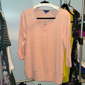 Never worn 3/4 shirt.  Cut out front.  Ruched sleeves.